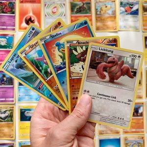 50 Pokémon Cards with five rare cards